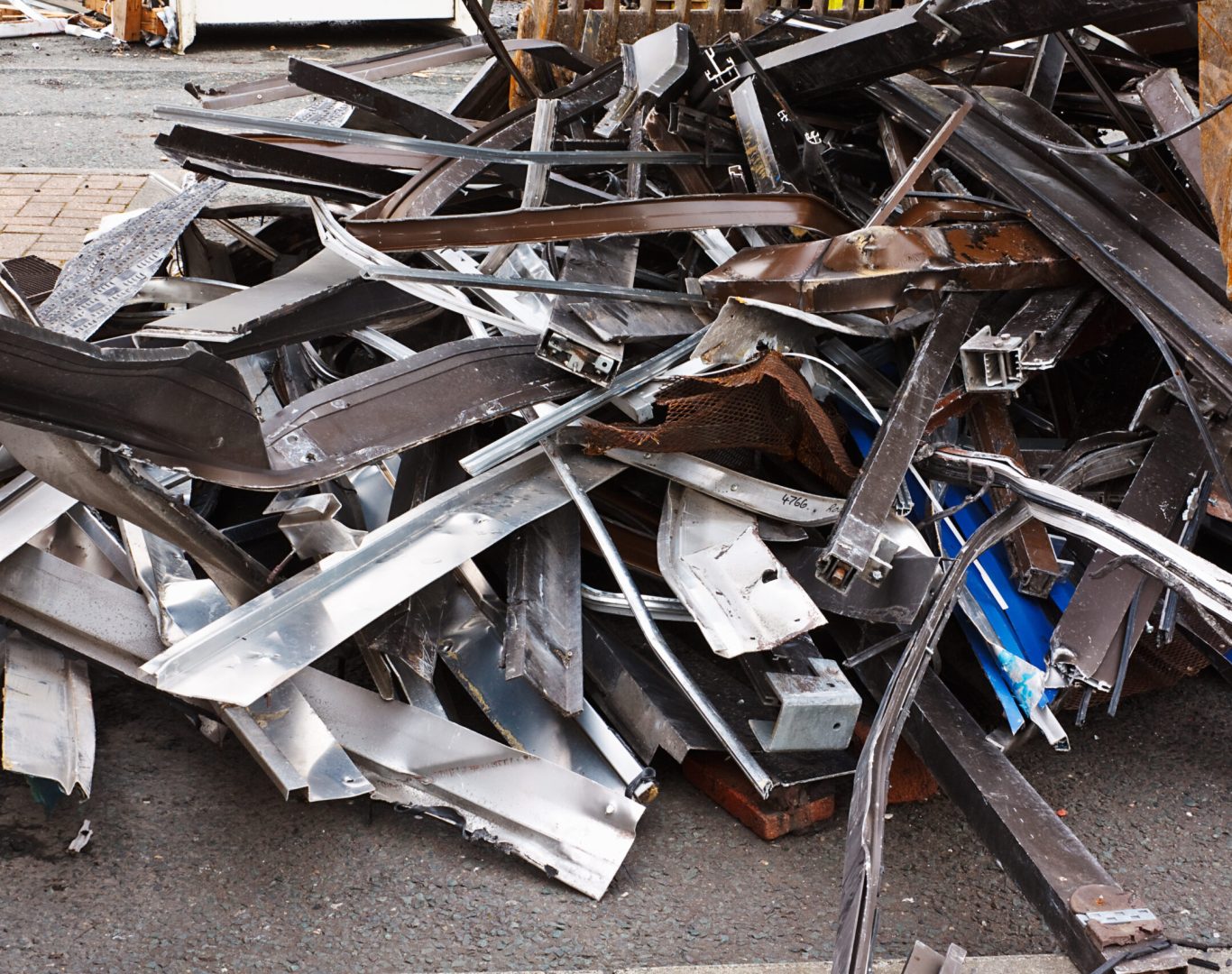 Scrap metal waste of iron and aluminum for recycling at a demolished building site